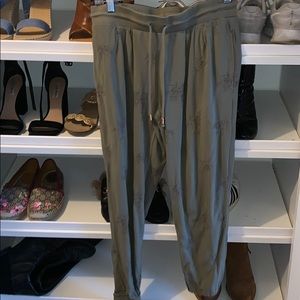 Green embroidered joggers